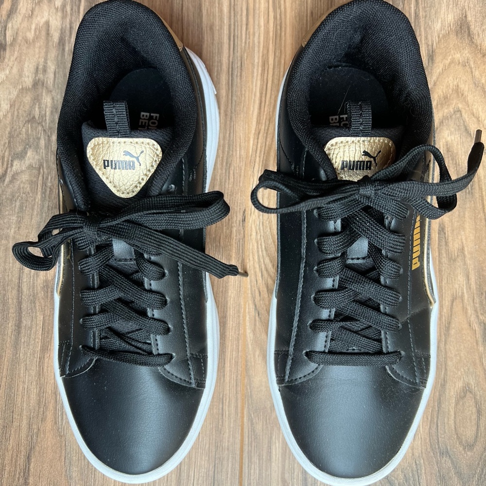 Puma Black and Gold Sneakers